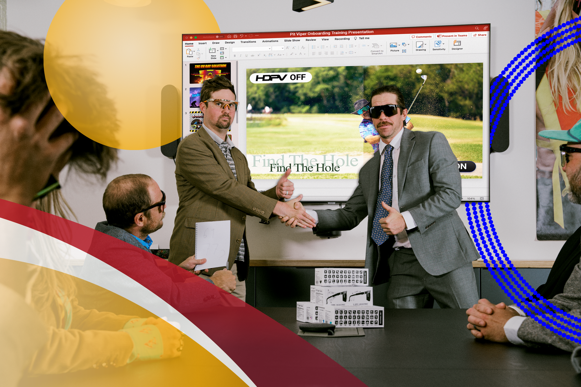 Two men shaking hands in a conference room with a screen displaying a golf game.