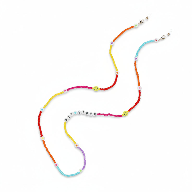  | product_flat_lay.JPG | Flat lay of the Beaded RIG multicolor bead chain with PIT VIPER letter beads on white background