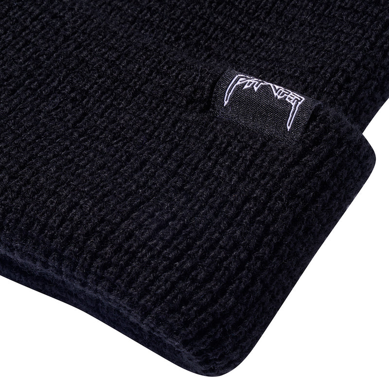 | im_ready_for_my_closeup.JPG | Close-up of a black beanie with white embroidery on a white background