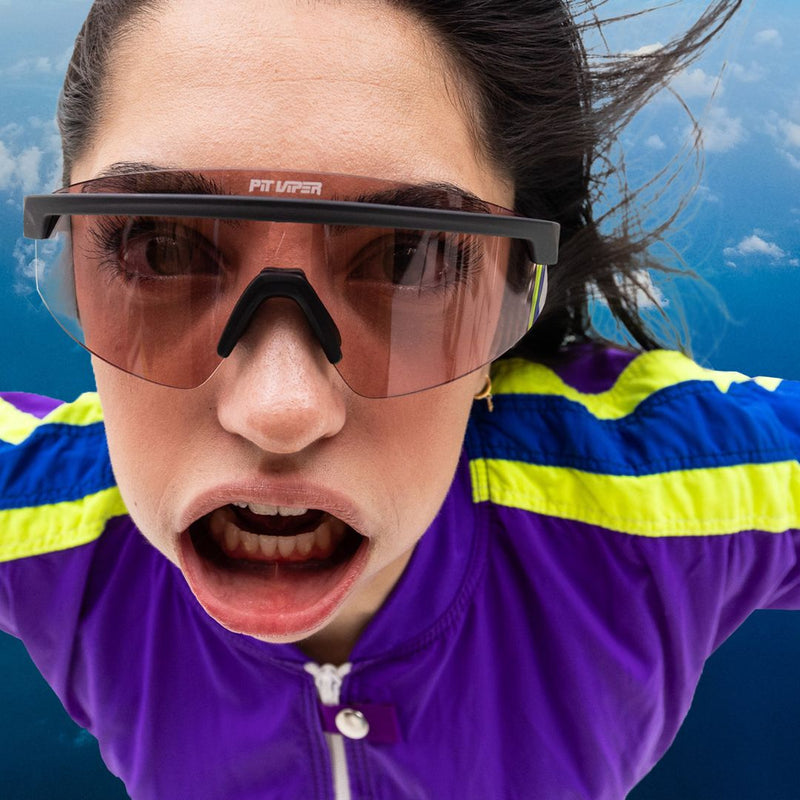 / Photochromic Rose | photo_of_person.JPG | Person wearing The Exec Skysurfer with Photochromic Rose lens