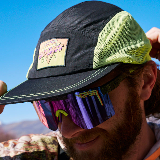  | photo_of_person.JPG | A bearded guy wearing the Sport Beer Hot Mesh Hot from Pit Viper