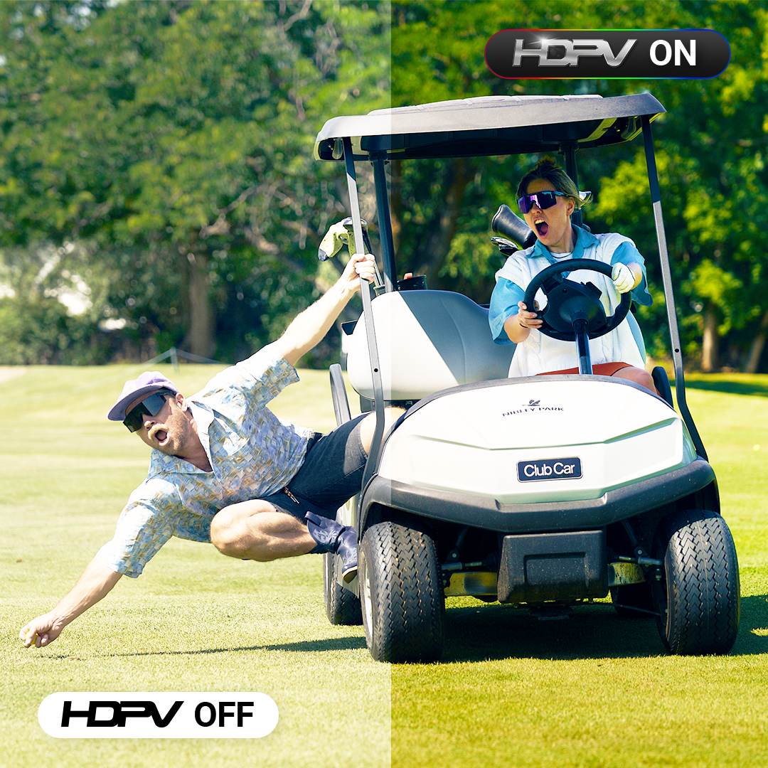 Two people on a golf course with one person in a golf cart and the other attempting to stop it, with 'HDPV ON' and 'HDPV OFF' labels.