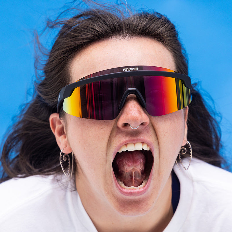 / Polarized Rainbow | photo_of_person.JPG | Person wearing The Exec Skysurfer with polarized Rainbow lens