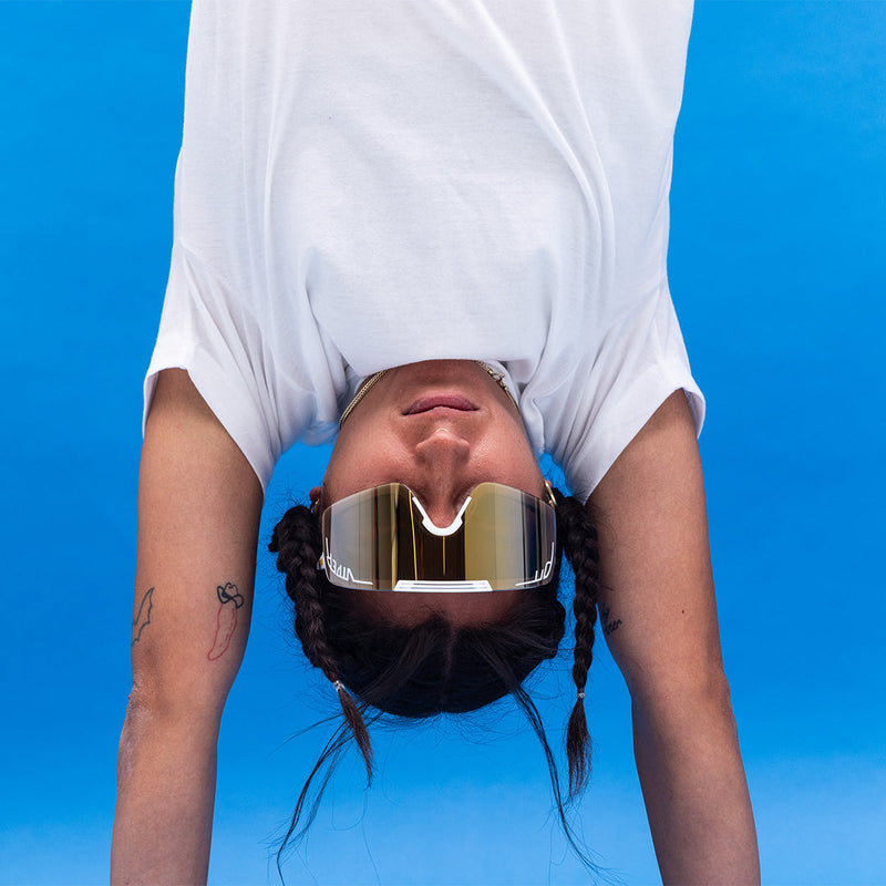 / Gold | photo_of_person.JPG | Person wearing The Miami Nights Synthesizer with Gold lens