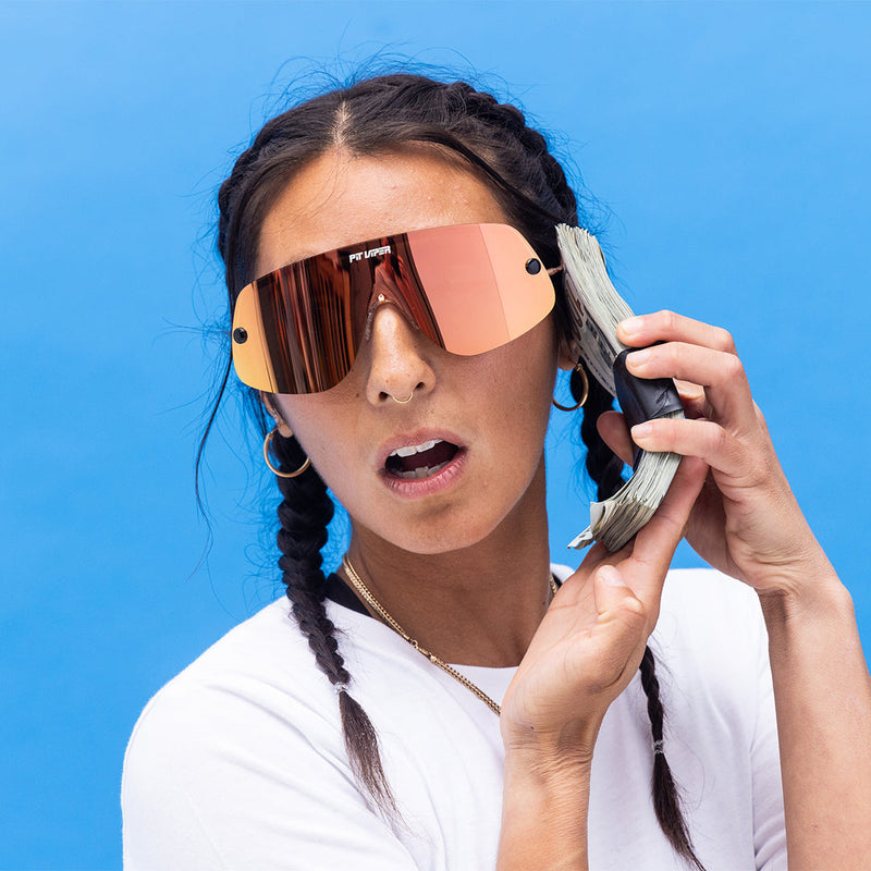 / Polarized Rose | photo_of_person_2.JPG | Person wearing The Rosé Limousine with polarized Rose lens
