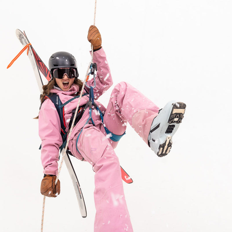  | photo_of_person.JPG | Woman repelling with skis wearing The Son of Peach Synthesizer from Pit Viper Sunglasses